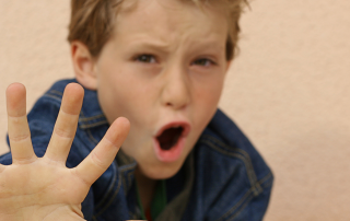 Defiant kid screaming