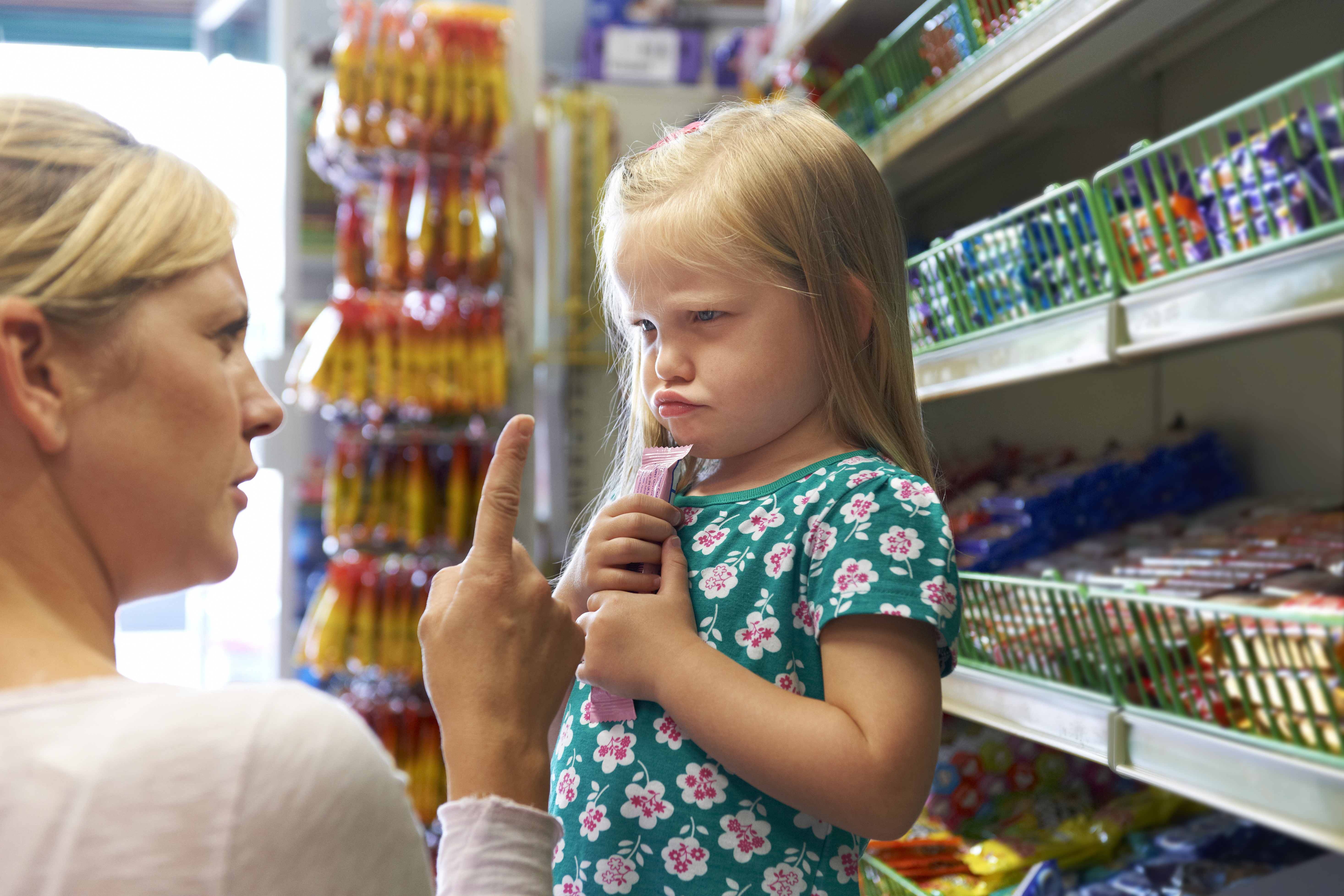 Child having tantrum in store