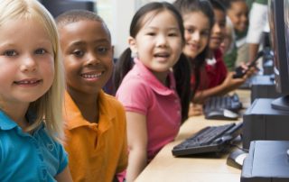 Young children at computer lab at school