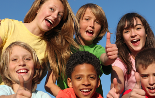 Kids thumbs up