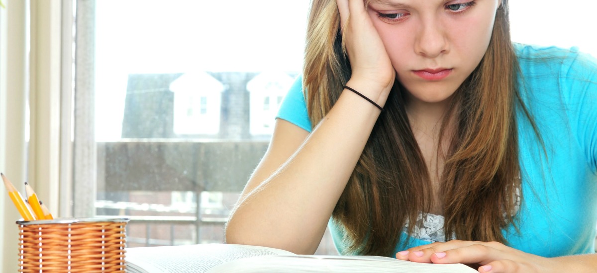 girl getting stressed about studying