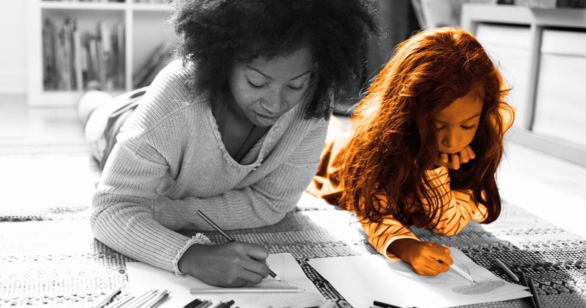 Woman drawing with small child